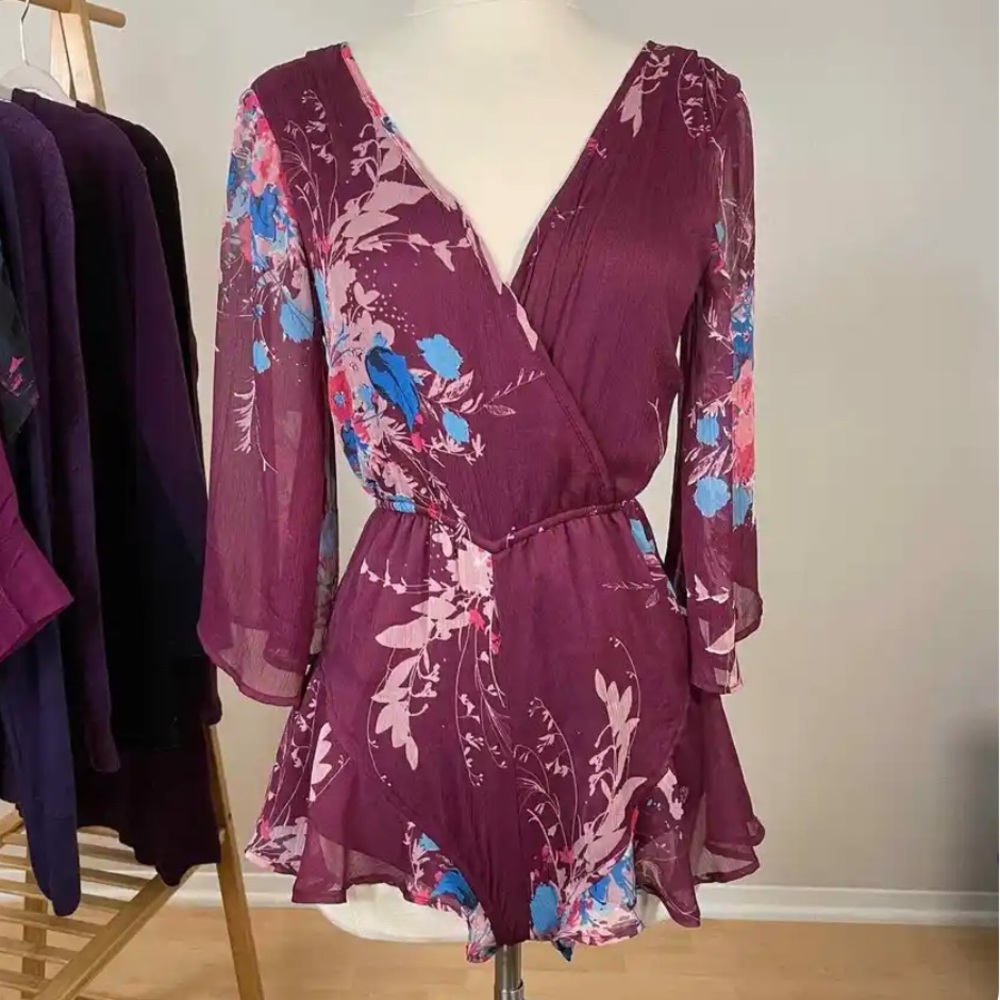 Band of Gypsies cute purple flirty romper with long sleeve and open tie back